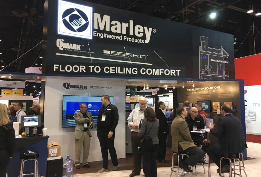 Marley flooring display at Flooring Show showcasing various styles and colors in a tradeshow setting